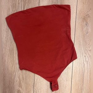 Express burnt orange tube top style bodysuit in size M
